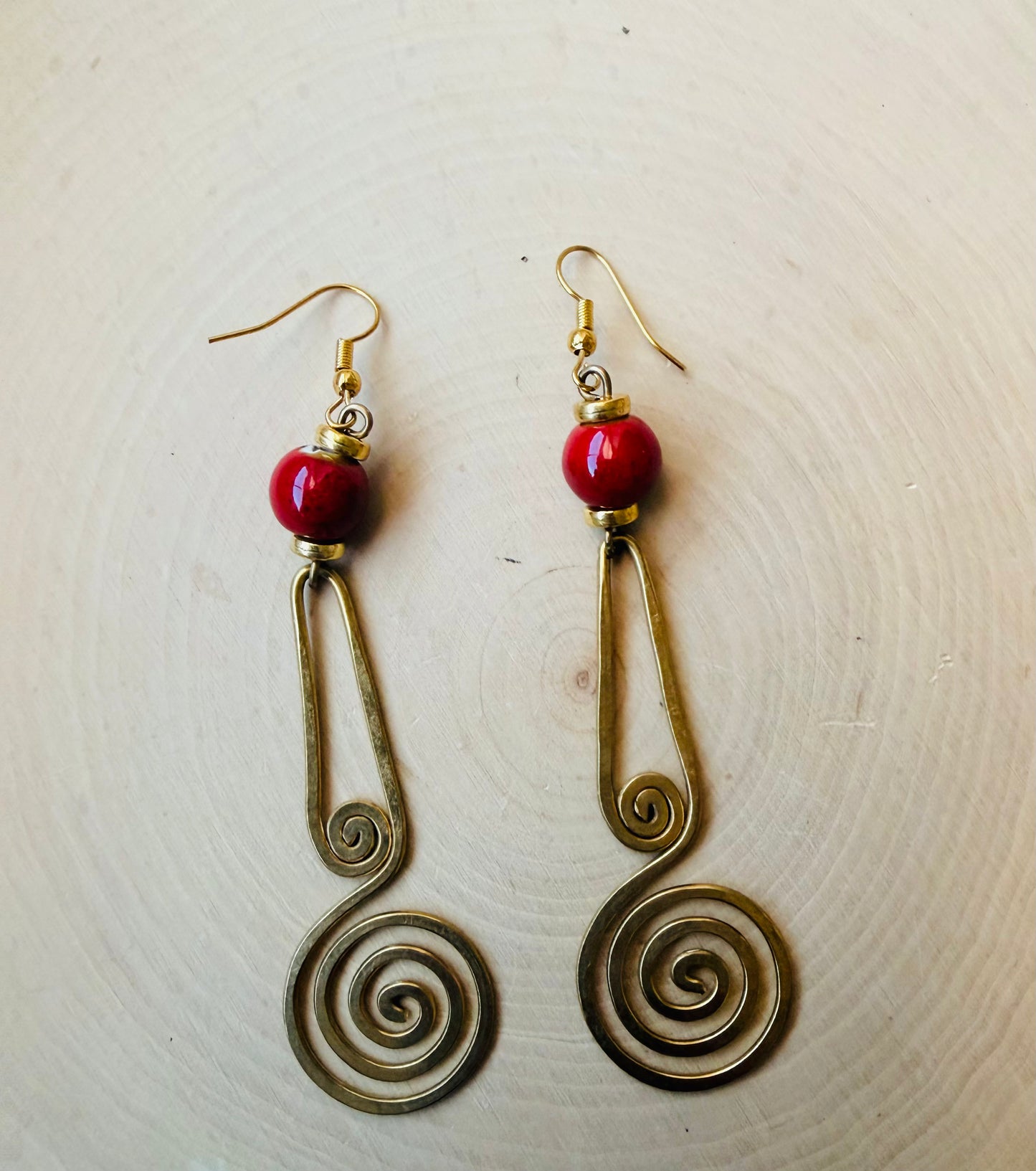 Red beaded spiral earrings