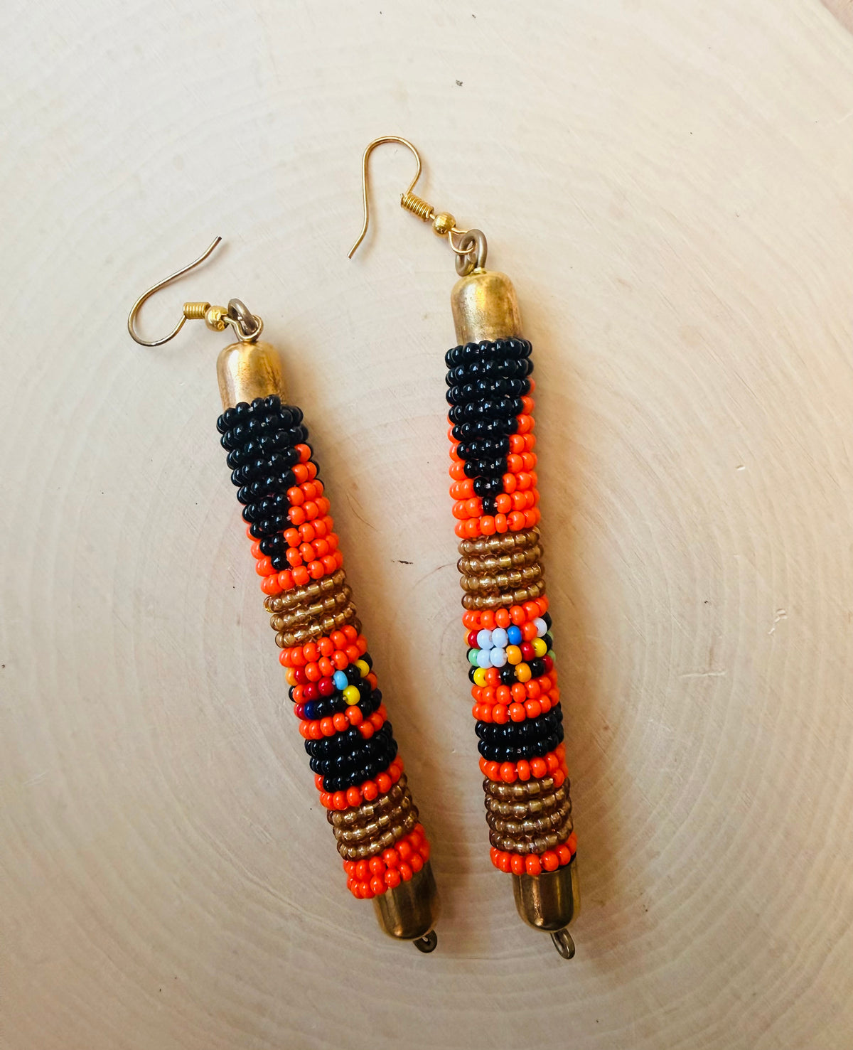 Orange and black beaded earrings