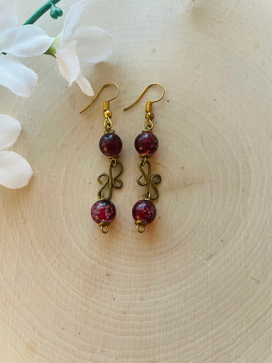 Small beaded brass earring