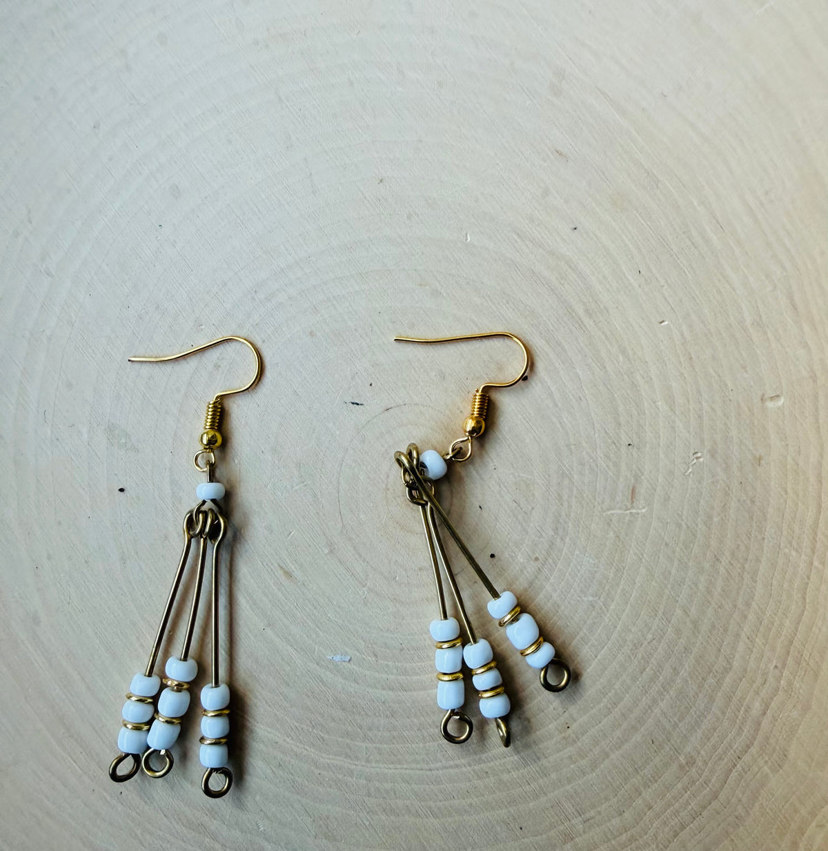 three line white beaded earrings