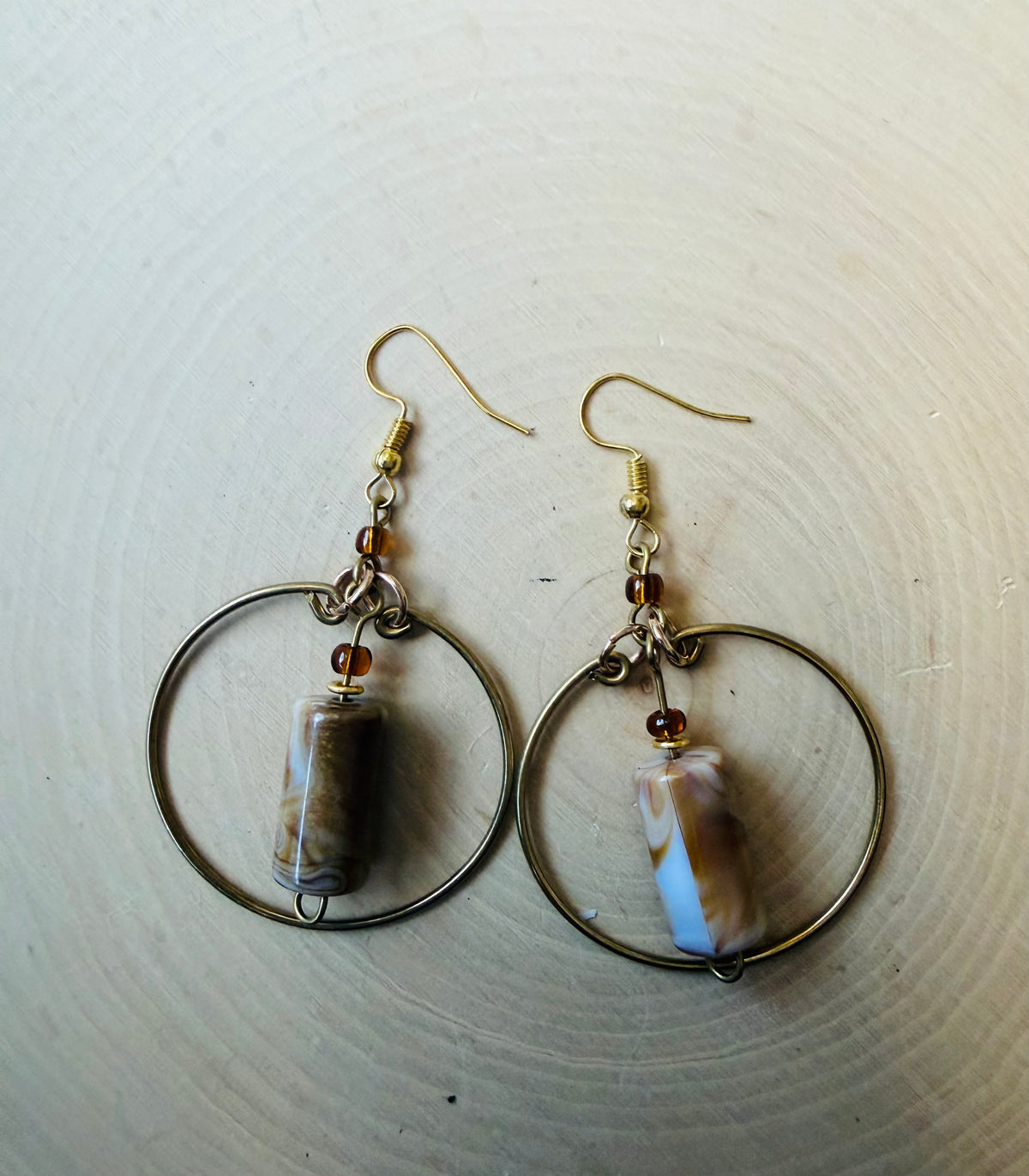 Brass hoop brown beaded earrings