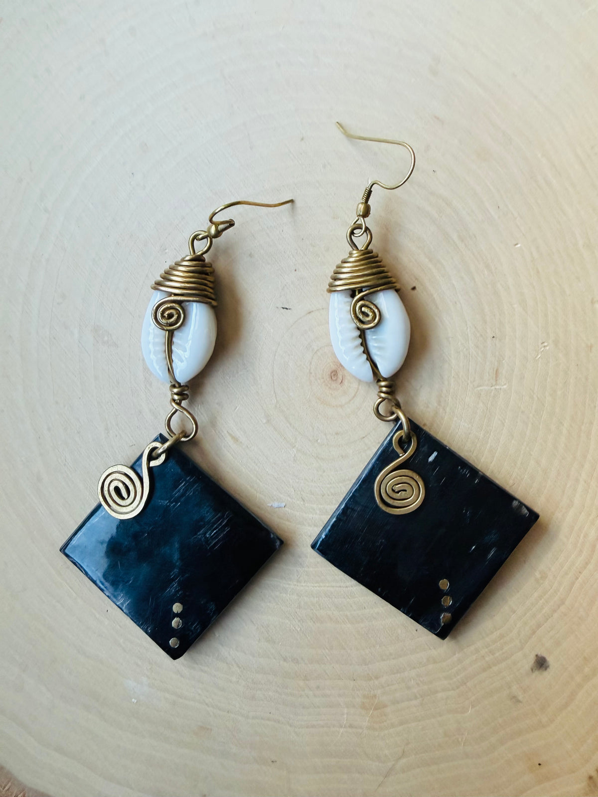 Triangle cowrie earrings